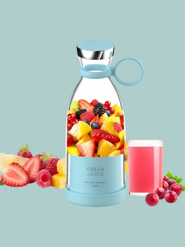 Portable blender mixing a fresh fruit smoothie